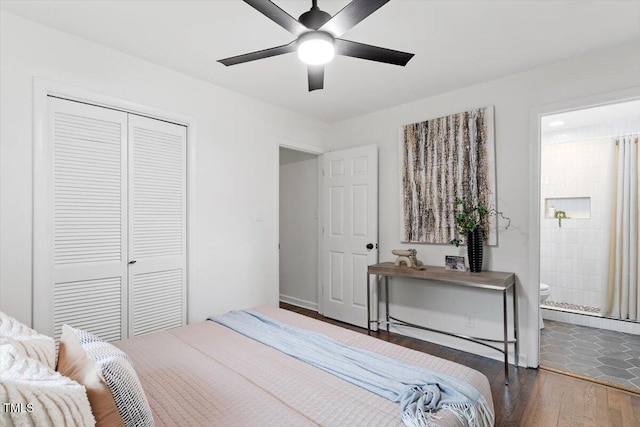3907 Inwood Dr, Durham, NC 27705 - bedroom with wood-type flooring, a closet, ensuite bath, a ceiling fan, and baseboards