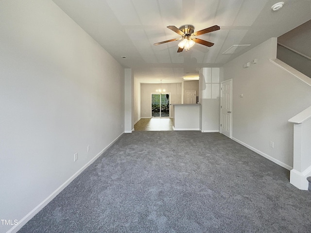 unfurnished living room featuring dark carpet, baseboards, and ceiling fan