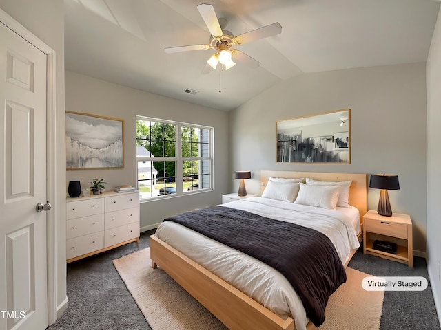 carpeted bedroom featuring visible vents, a ceiling fan, baseboards, and lofted ceiling