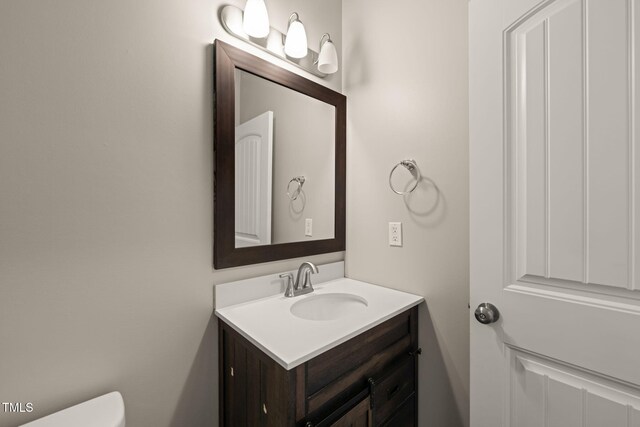5011 Peachtree Town Ln, Knightdale, NC 27545 - half bath featuring vanity and toilet