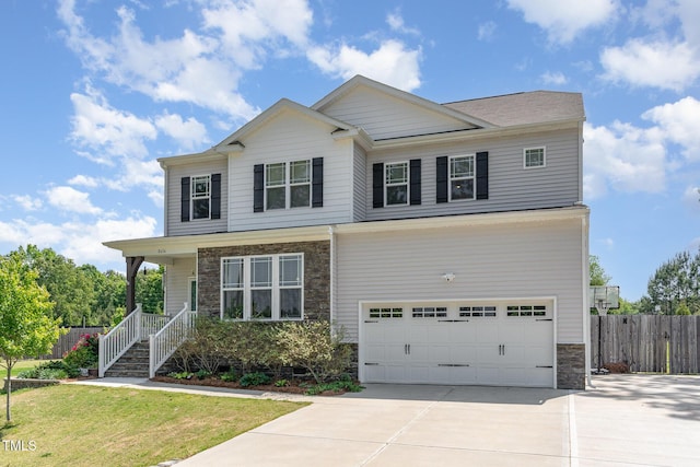 view of front of house featuring a porch, a garage, fence, concrete driveway, and stone siding