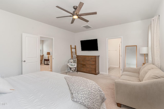 bedroom featuring baseboards, light carpet, a ceiling fan, and visible vents