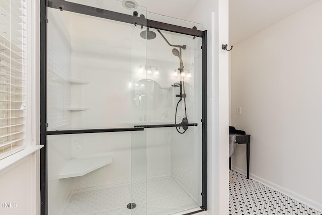 full bathroom featuring a shower stall