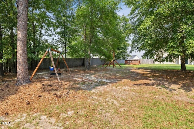 206 Wynngate Dr, Cameron, NC 28326 - fenced backyard featuring a playground