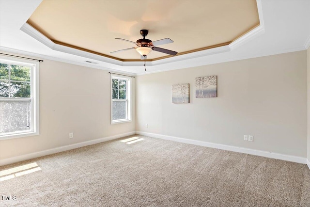 206 Wynngate Dr, Cameron, NC 28326 - carpeted empty room with a raised ceiling, ceiling fan, baseboards, and crown molding