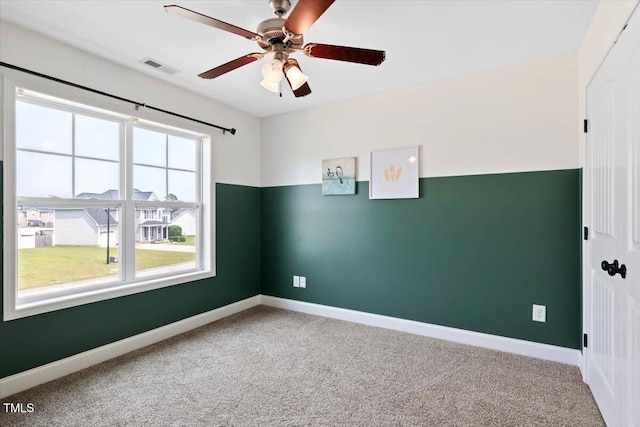 206 Wynngate Dr, Cameron, NC 28326 - carpeted spare room featuring healthy amount of natural light, baseboards, and ceiling fan