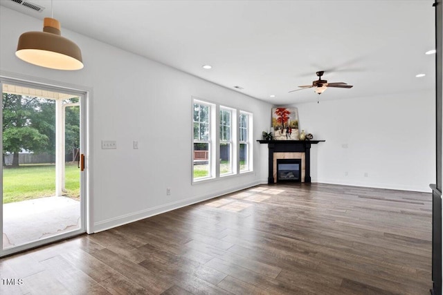 206 Wynngate Dr, Cameron, NC 28326 - unfurnished living room featuring a ceiling fan, wood finished floors, a glass covered fireplace, recessed lighting, and baseboards