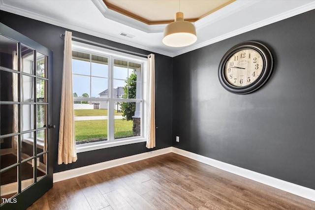 206 Wynngate Dr, Cameron, NC 28326 - unfurnished room featuring a tray ceiling, dark wood-style flooring, crown molding, and baseboards