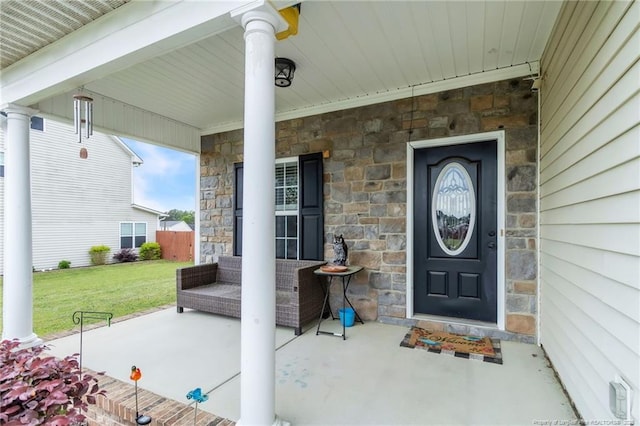 110 Wynngate Dr, Cameron, NC 28326 - property entrance featuring a lawn, covered porch, and stone siding