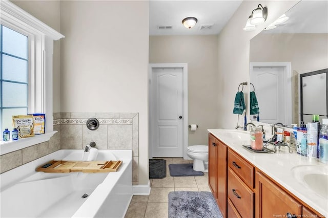 110 Wynngate Dr, Cameron, NC 28326 - full bath featuring double vanity, a garden tub, visible vents, tile patterned flooring, and a sink