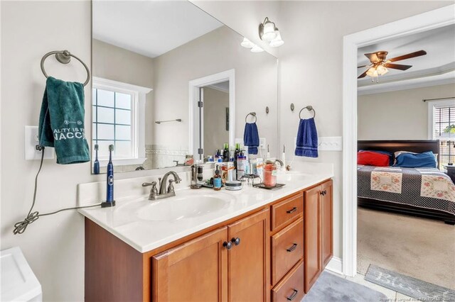 110 Wynngate Dr, Cameron, NC 28326 - ensuite bathroom featuring double vanity, a ceiling fan, a sink, and ensuite bath