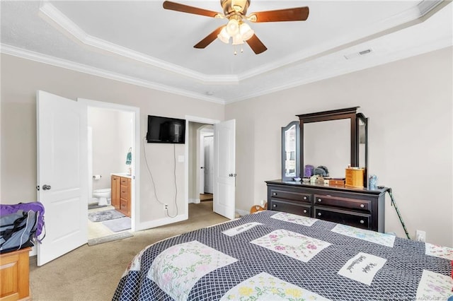 110 Wynngate Dr, Cameron, NC 28326 - bedroom featuring crown molding, carpet floors, ensuite bathroom, a tray ceiling, and visible vents