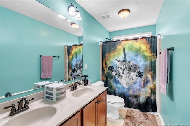 110 Wynngate Dr, Cameron, NC 28326 - bathroom with visible vents, a sink, double vanity, and toilet