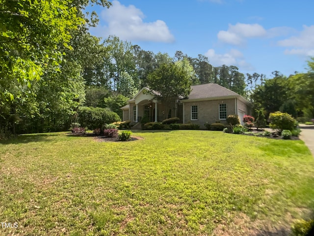 view of front of home with a front lawn