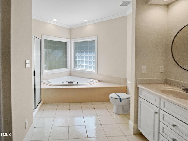 bathroom featuring a garden tub, crown molding, a shower stall, vanity, and toilet