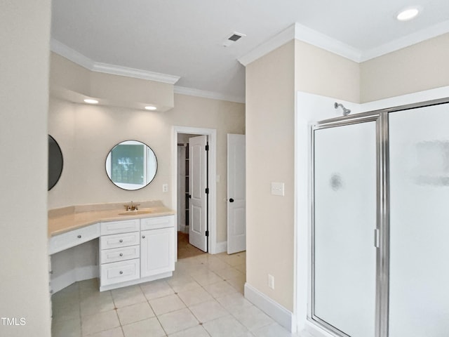 bathroom featuring crown molding, vanity, baseboards, tile patterned floors, and a shower stall