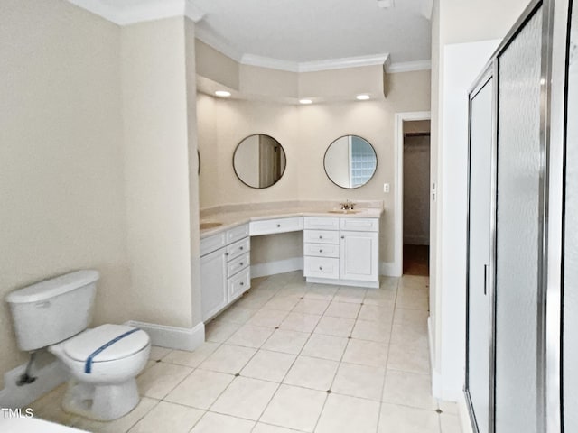 full bathroom featuring vanity, ornamental molding, toilet, tile patterned floors, and a stall shower