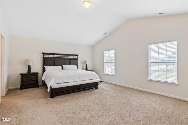 3912 Huntsmoor Ln, Wilson, NC 27896 - bedroom featuring light colored carpet, baseboards, lofted ceiling, and visible vents
