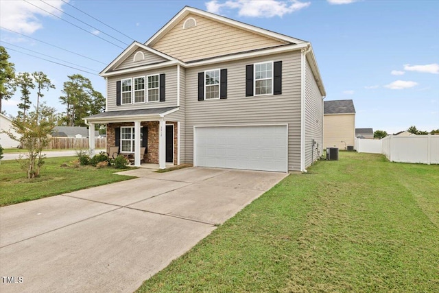 3912 Huntsmoor Ln, Wilson, NC 27896 - view of front of house with a front yard, central air condition unit, fence, concrete driveway, and an attached garage