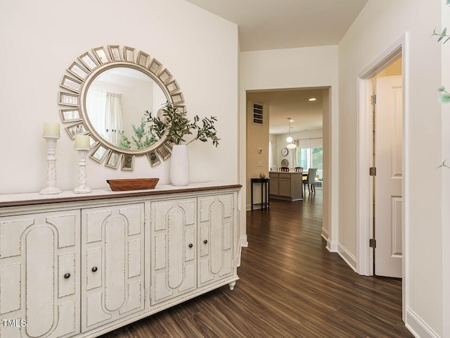 555 Whitley Ridge Dr, Clayton, NC 27527 - corridor featuring dark wood-type flooring and baseboards