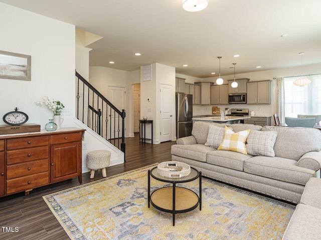 555 Whitley Ridge Dr, Clayton, NC 27527 - living area with dark wood-style flooring, stairs, and recessed lighting