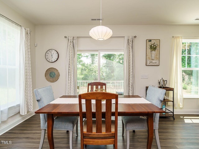 555 Whitley Ridge Dr, Clayton, NC 27527 - dining area featuring dark wood-type flooring and baseboards