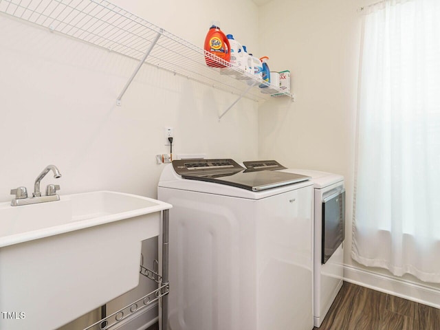 555 Whitley Ridge Dr, Clayton, NC 27527 - clothes washing area featuring independent washer and dryer and dark wood-type flooring