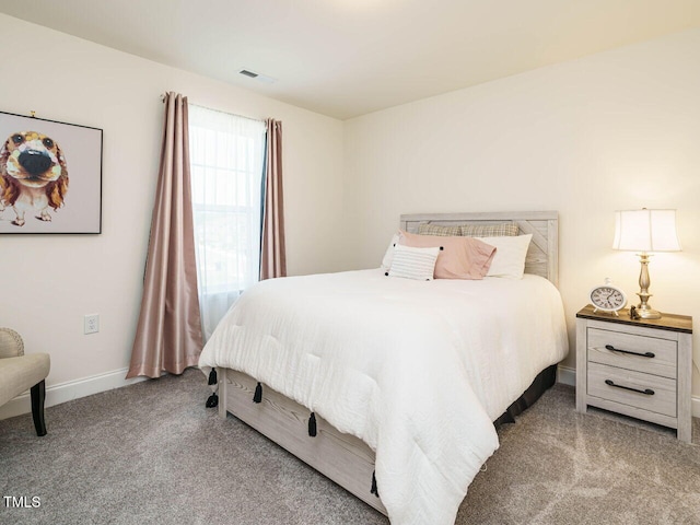 555 Whitley Ridge Dr, Clayton, NC 27527 - carpeted bedroom featuring baseboards
