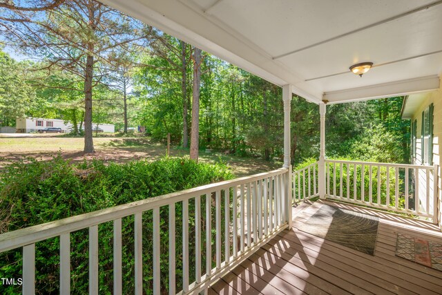 145 Mark St, Franklinton, NC 27525 - wooden terrace featuring a porch
