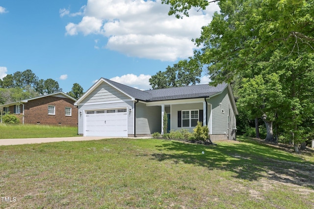 ranch-style home with a garage, a front yard, and driveway