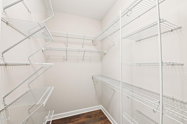 spacious closet with wood finished floors