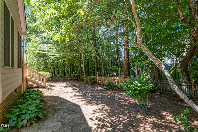 view of yard featuring fence