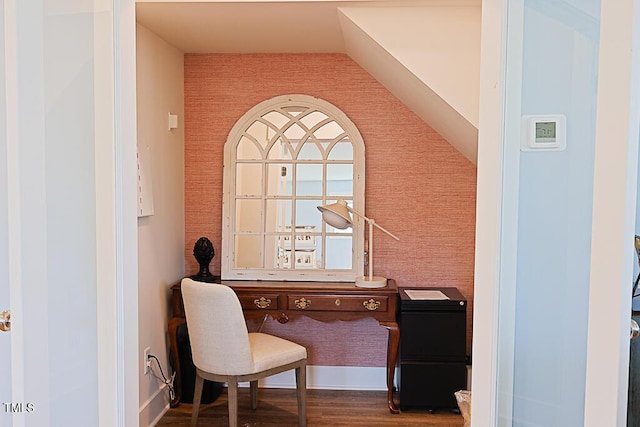 home office featuring baseboards and wood finished floors