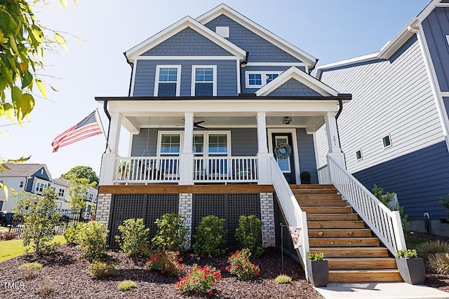 view of front of home with a porch and stairs