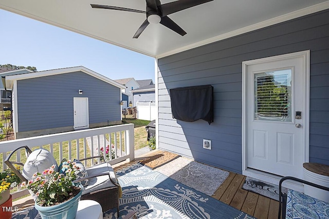 exterior space with a ceiling fan