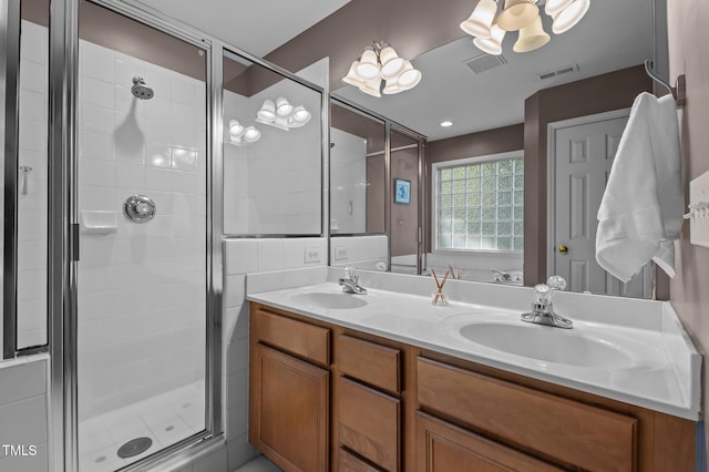 612 Lakeview Ave, Wake Forest, NC 27587 - bathroom featuring a sink, a chandelier, and a shower stall