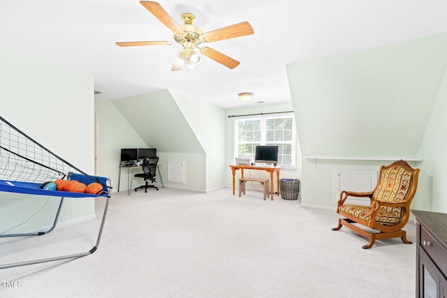 interior space featuring baseboards, carpet flooring, and a ceiling fan