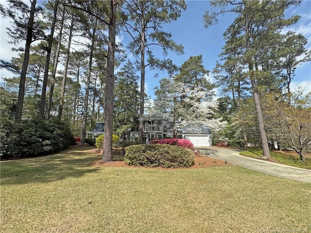 161 Lakeview Dr, Southern Pines, NC 28387 - view of front of property with a garage, driveway, and a front yard