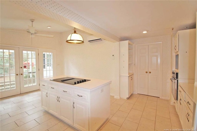 161 Lakeview Dr, Southern Pines, NC 28387 - kitchen featuring french doors, black electric cooktop, light countertops, white cabinetry, and oven