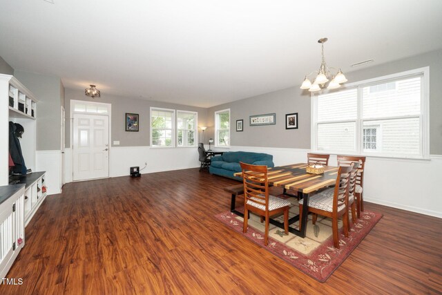 149 Cinder Cross Way, Garner, NC 27529 - dining room with a chandelier and dark wood-style floors