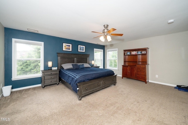 149 Cinder Cross Way, Garner, NC 27529 - bedroom with baseboards, light colored carpet, and a ceiling fan