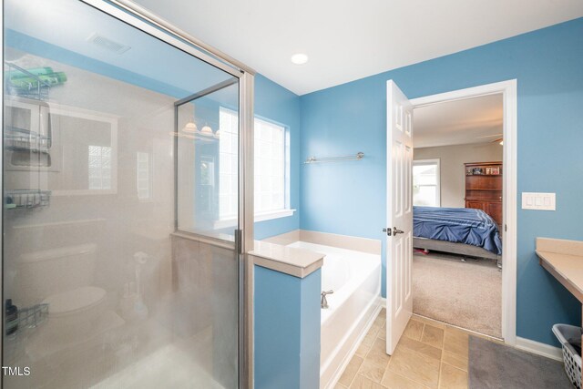149 Cinder Cross Way, Garner, NC 27529 - bathroom with a bath, a shower stall, connected bathroom, and recessed lighting