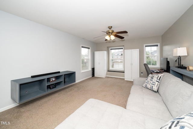 149 Cinder Cross Way, Garner, NC 27529 - living area with carpet flooring, baseboards, and a ceiling fan