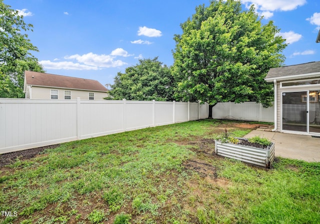 149 Cinder Cross Way, Garner, NC 27529 - view of yard featuring a vegetable garden and a patio