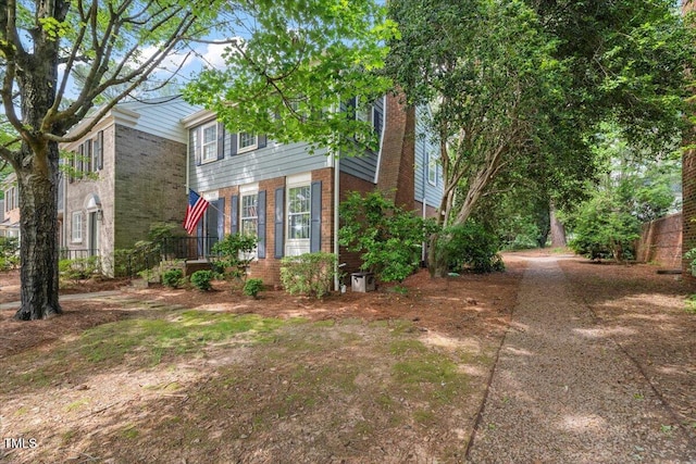 3025 Wycliff Rd, Raleigh, NC 27607 - view of home's exterior with brick siding