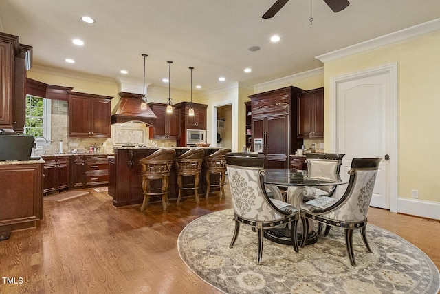5901 Charleycote Dr, Raleigh, NC 27614 - dining room with recessed lighting, ceiling fan, and ornamental molding
