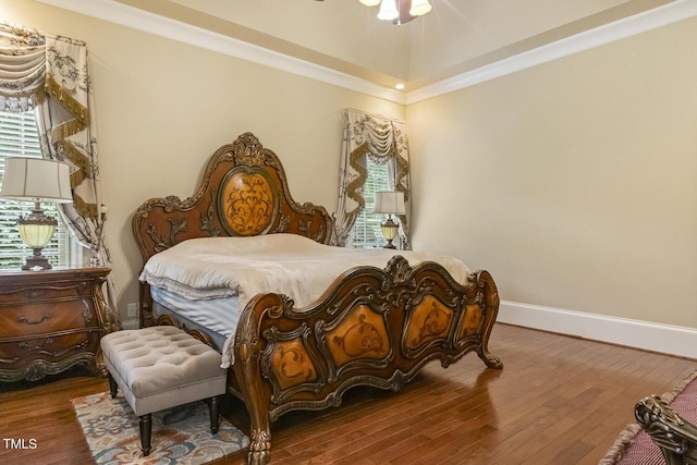 5901 Charleycote Dr, Raleigh, NC 27614 - bedroom featuring baseboards, multiple windows, wood finished floors, and ornamental molding