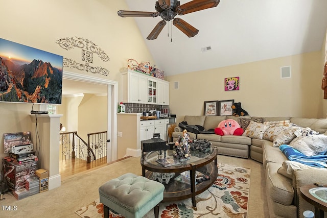5901 Charleycote Dr, Raleigh, NC 27614 - living room with high vaulted ceiling, ceiling fan, visible vents, and light colored carpet