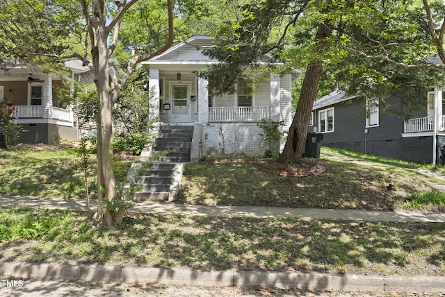 1022 Dorothea Dr, Raleigh, NC 27603 - view of front of home with stairway, a porch, and crawl space