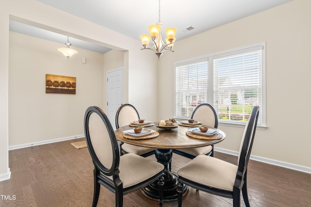 1104 Arden Trace Ct, Fuquay Varina, NC 27526 - dining space featuring dark wood-style floors, a chandelier, and baseboards